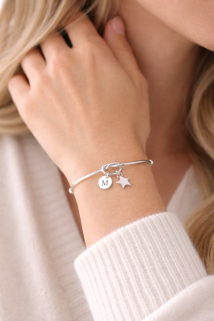 Minimalist silver star bracelet with personalized initial charm