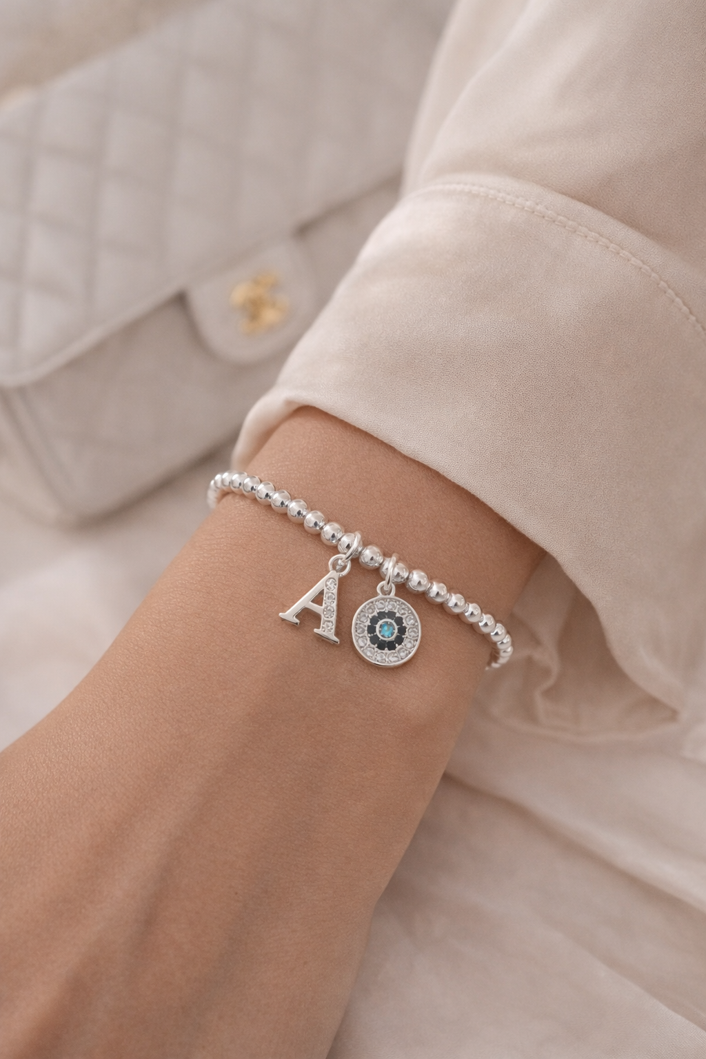 Personalized silver initial evil eye charm bracelet