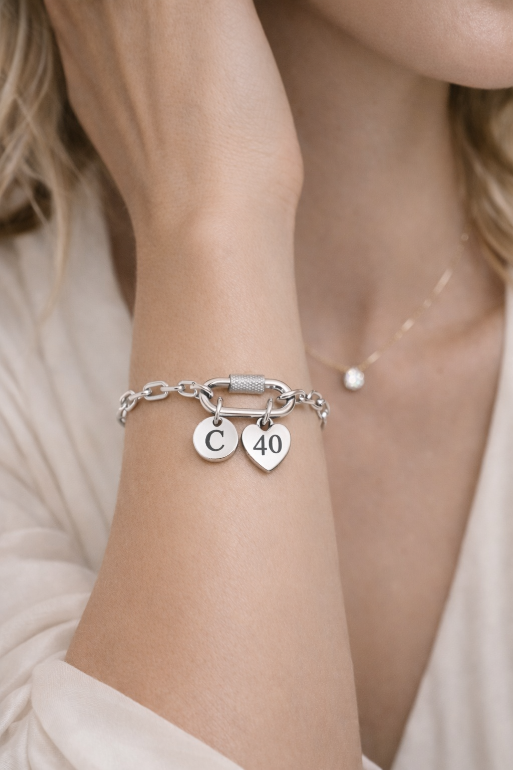Woman wearing a 40th birthday keepsake bracelet